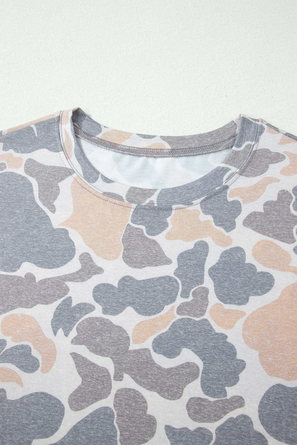 Retro Camo Print casual tee in oversized fit with soft fabric featuring beige, gray, and white camouflage pattern