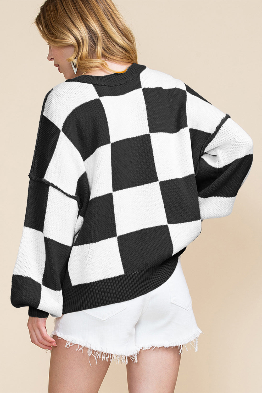 Black checkered bishop sleeve sweater in soft premium fabric for modern style