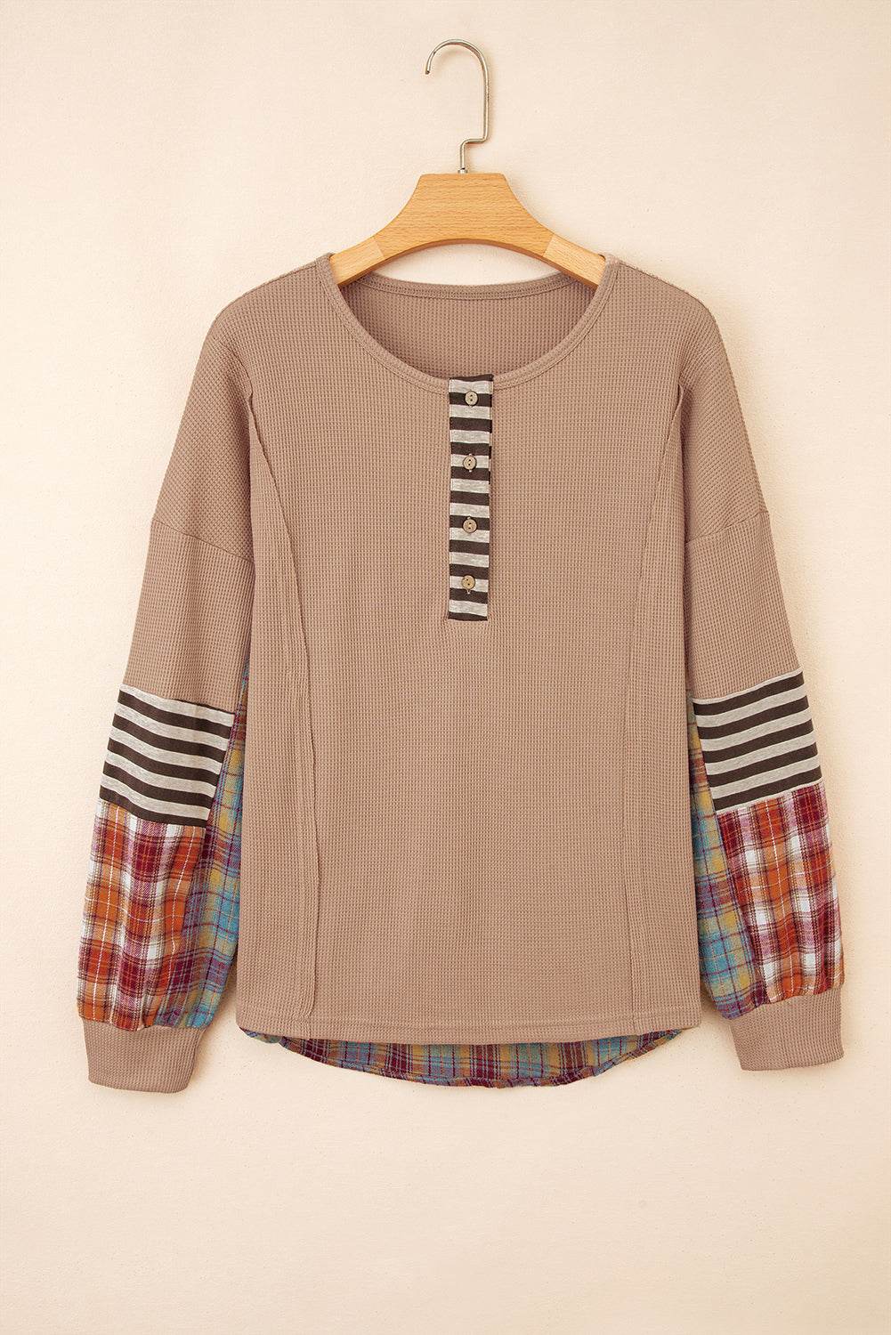 Long-sleeve Henley top with striped button placket, plaid and striped patchwork sleeves, and solid beige body, featuring Straw Yellow Waffle Knit fabric.