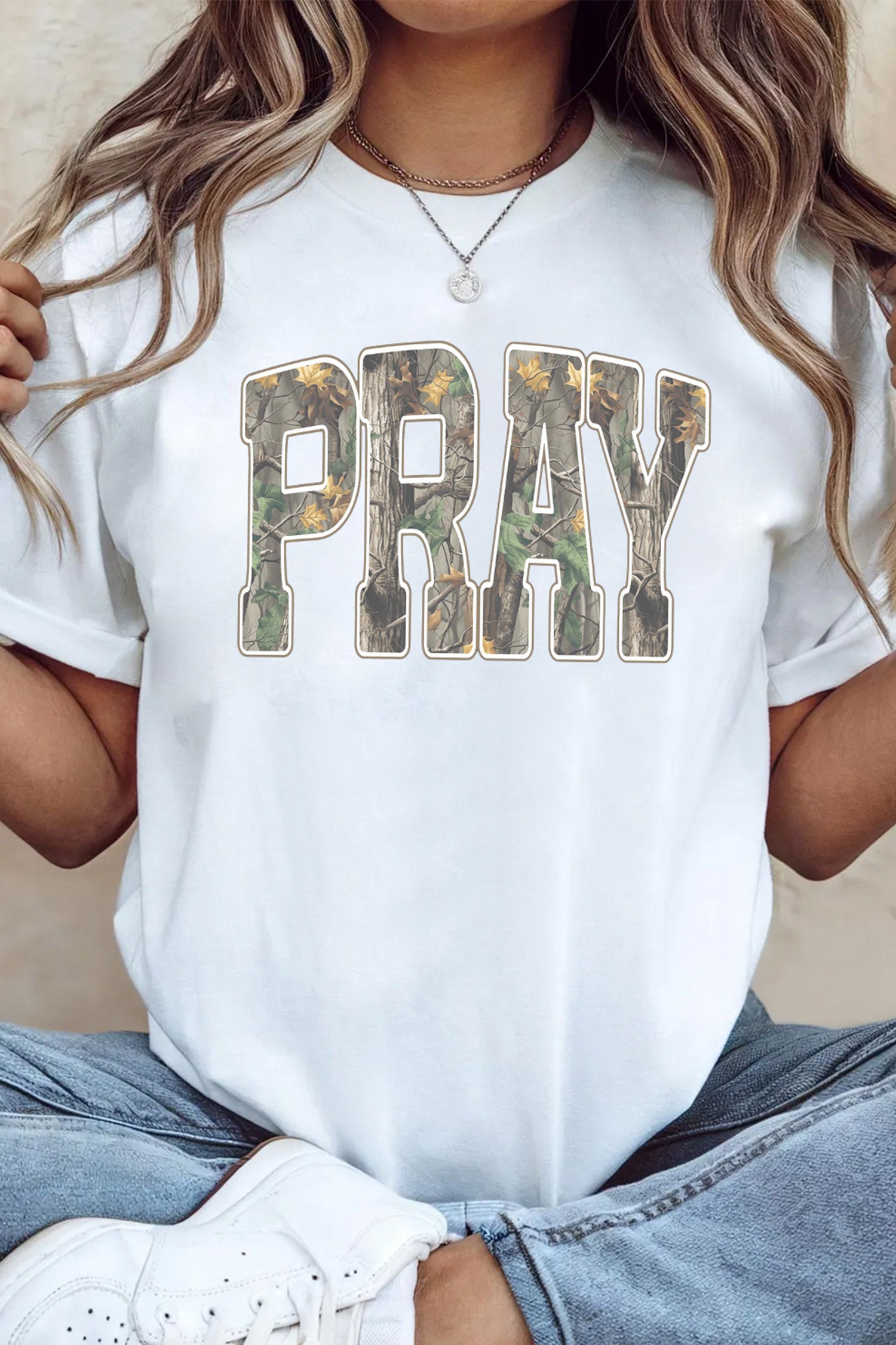 White PRAY camo letter print t-shirt lifestyle angled view
