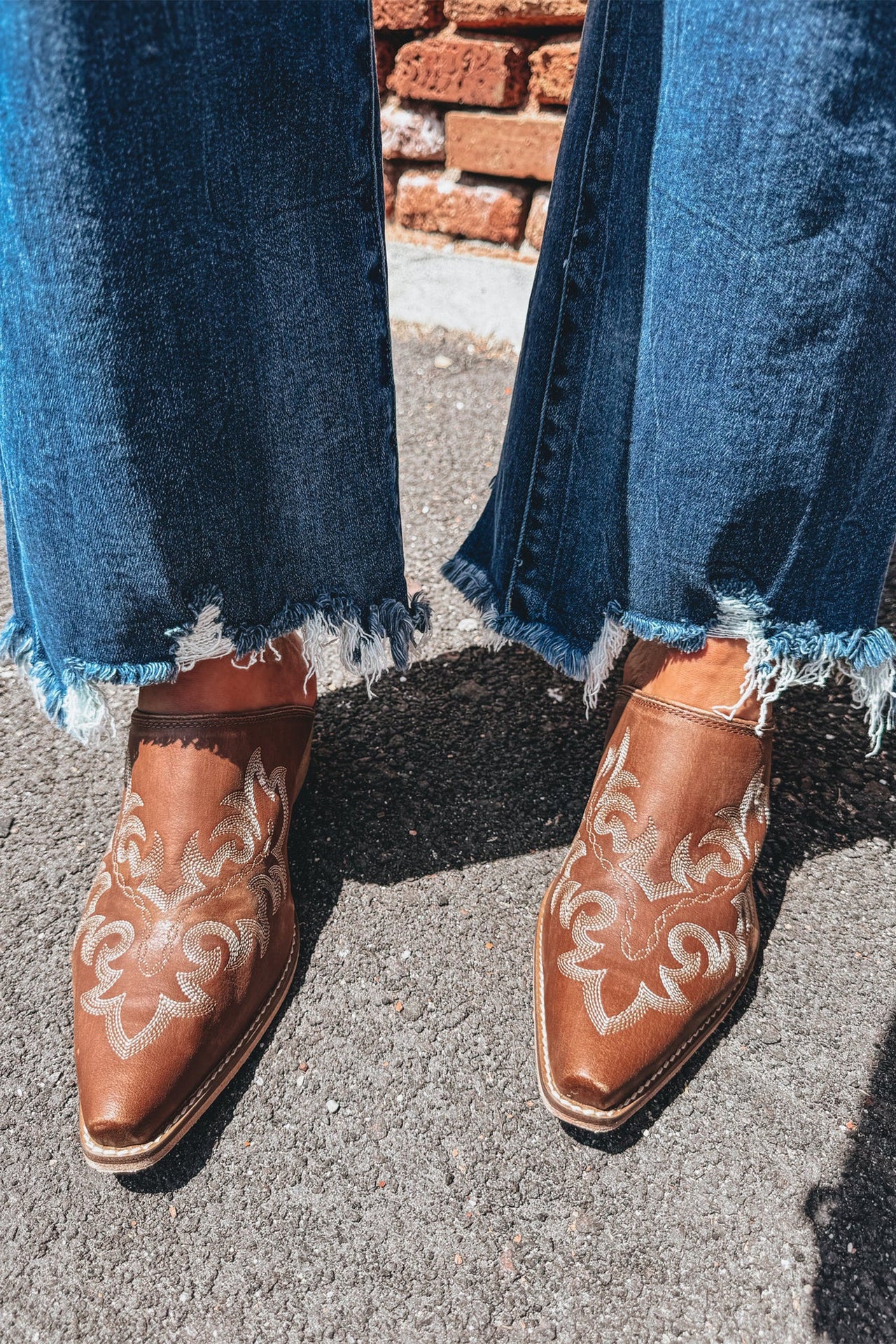 Ashleigh Blue high-waist flare jeans with frayed hems and classic denim style