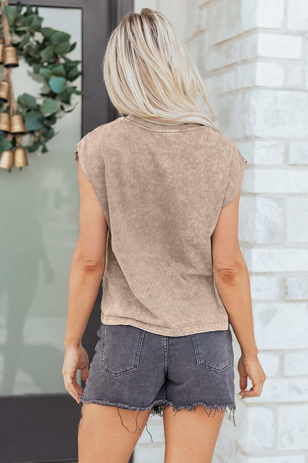 Sleeveless mineral wash tank top in taupe with a relaxed fit and lightweight fabric featuring Cowboys & Beer graphic on front.