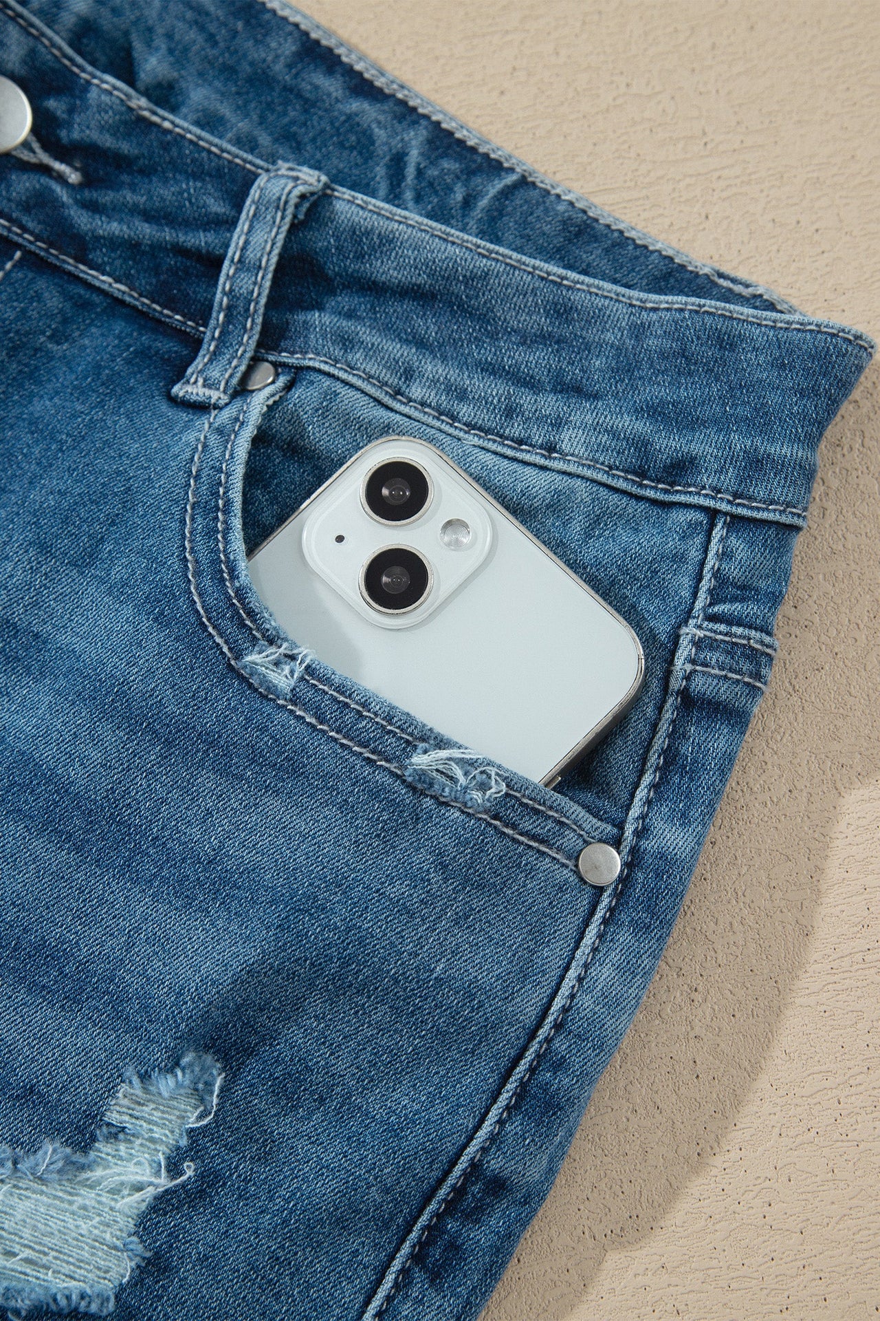Ashleigh Blue high waist flare jeans with frayed hems and classic denim style