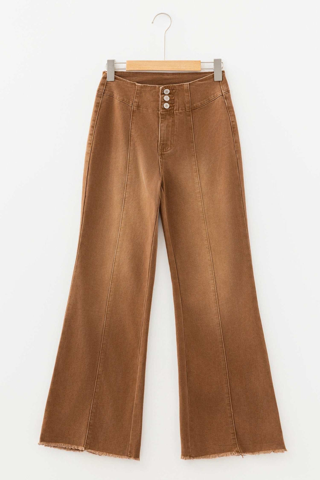 Coffee High Waist jeans in brown denim with a button fly, raw hem, and seamed detailing for a flare silhouette.