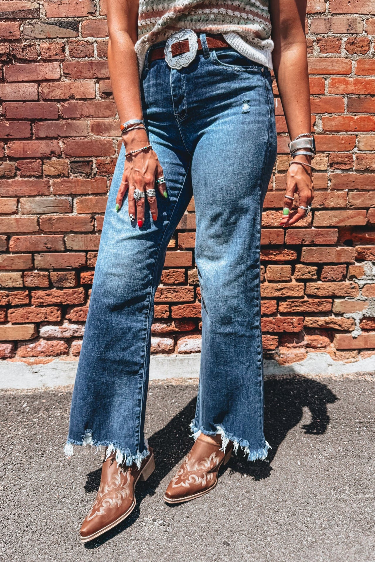 Ashleigh Blue high waist flare jeans with frayed hems and classic denim style