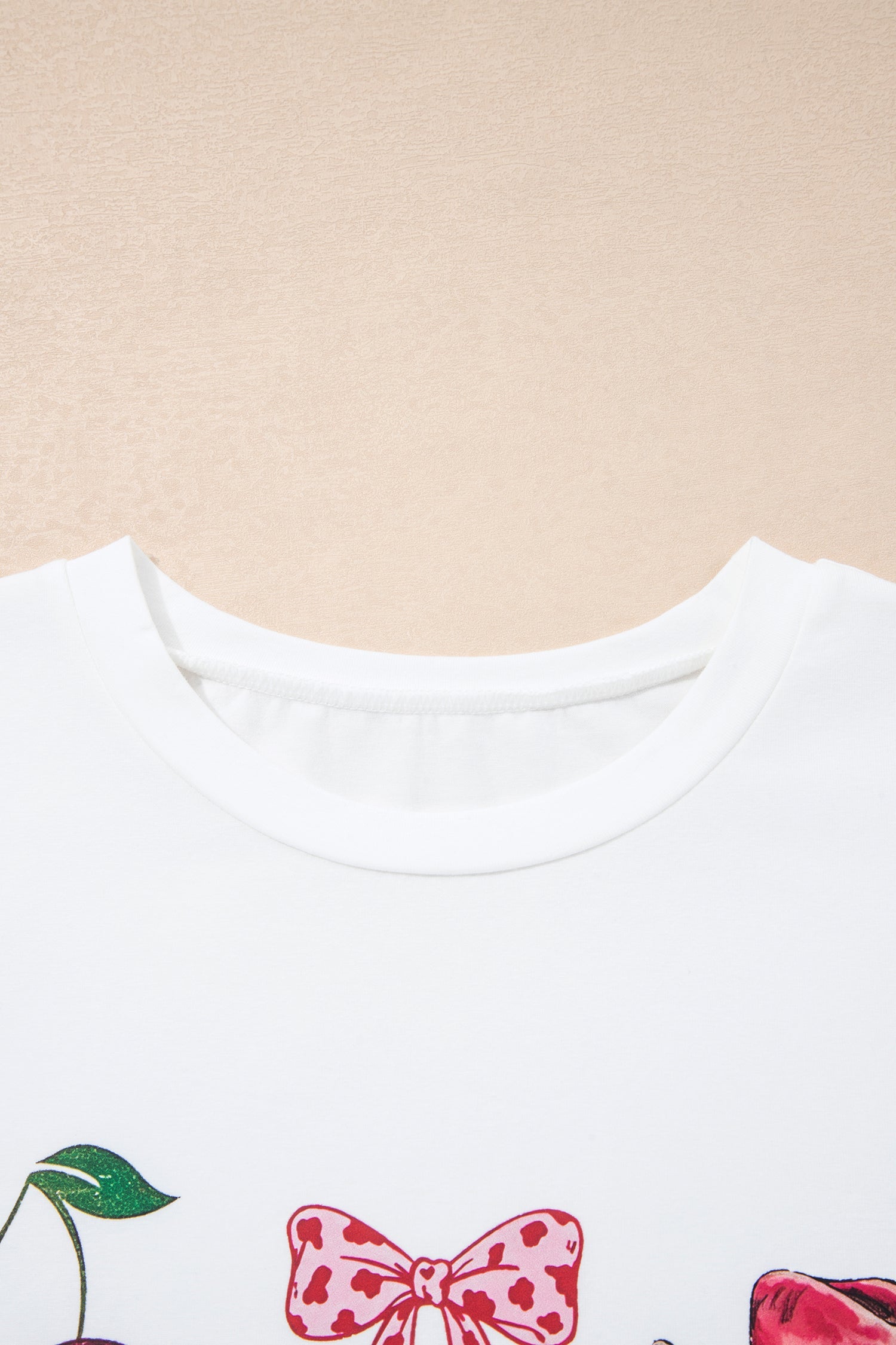 White Coquette Cowgirl Elements relaxed tee with heart, boot, and star graphics