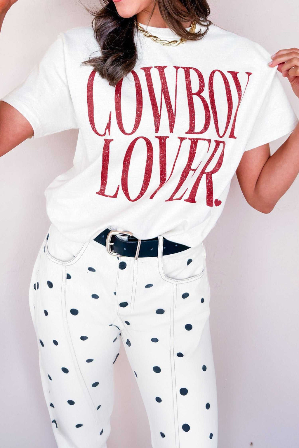 Women's white graphic tee with COWBOY LOVER lettering