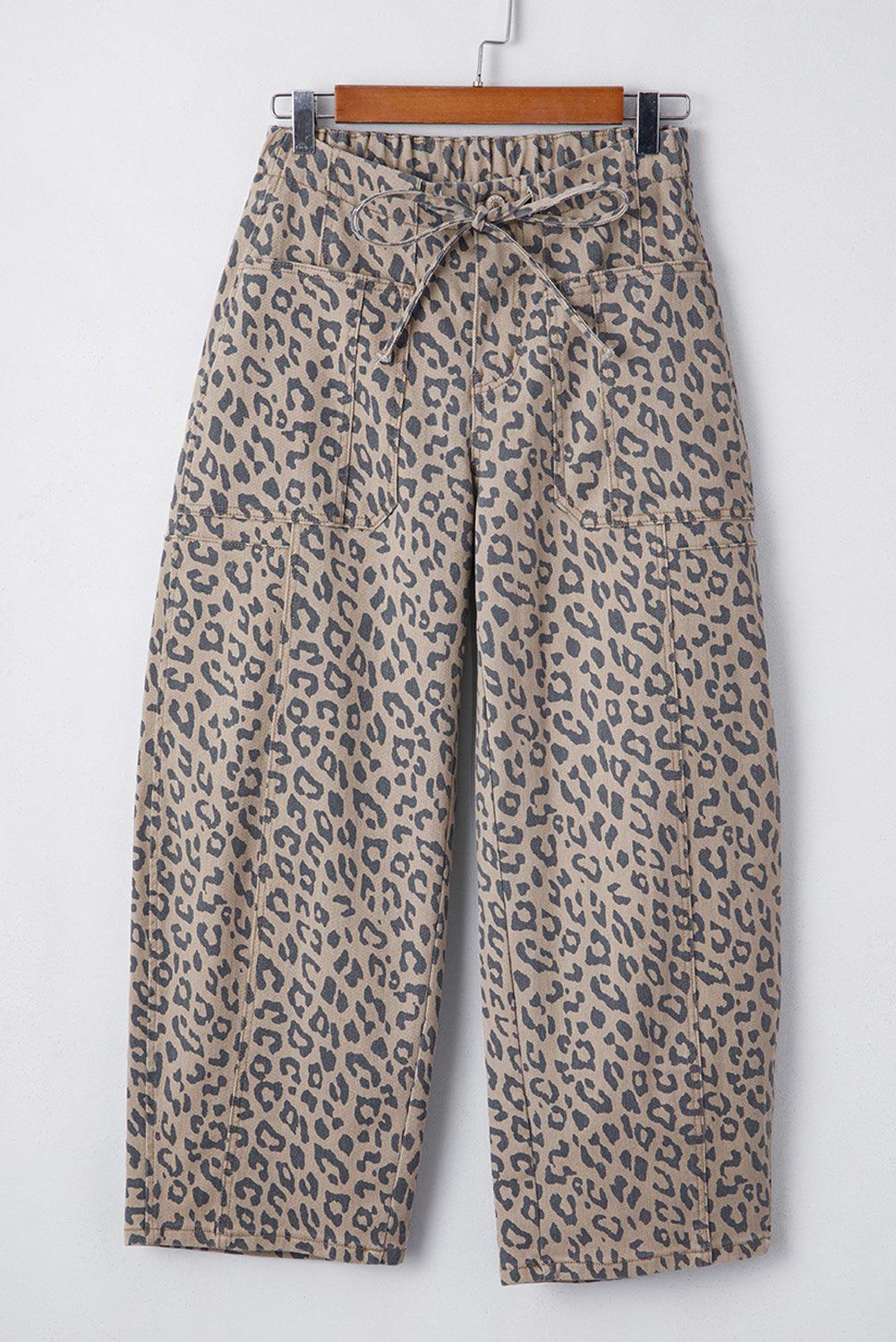 Khaki Leopard Drawstring barrel-fit jeans with elastic waist, side pockets, and all-over leopard print pattern.