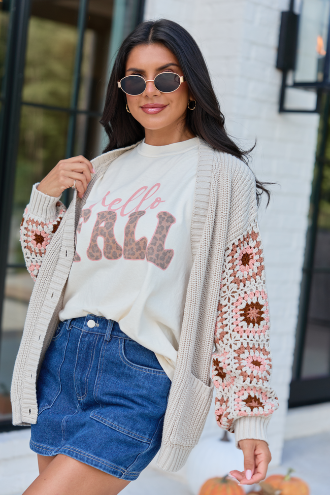 Cropped detail view of Hello Fall Leopard Ivory Graphic Tee paired with a colorful crochet cardigan