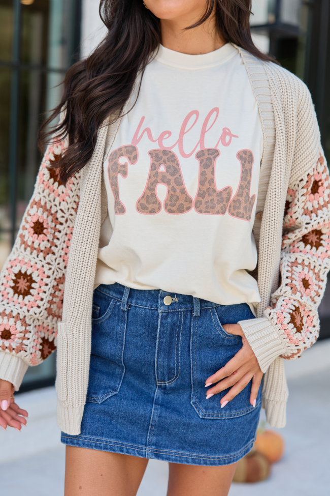 Hello Fall Leopard Ivory Graphic Tee paired with denim mini skirt and knit cardigan
