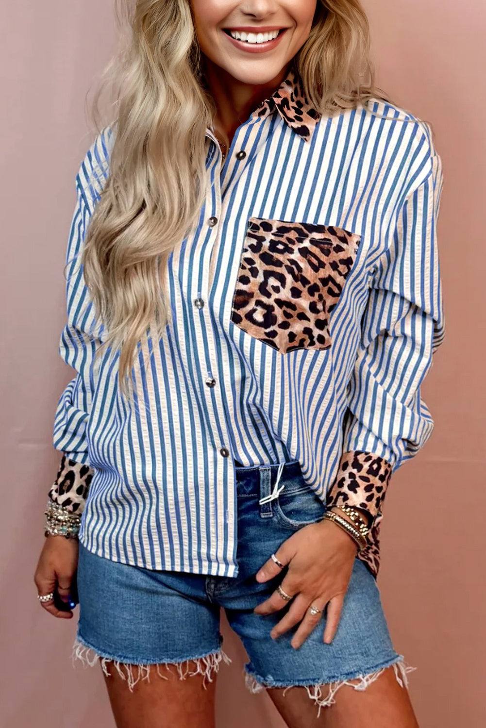 Button-up shirt with blue and white vertical stripes, leopard print collar and pocket, featuring Racing Red accents
