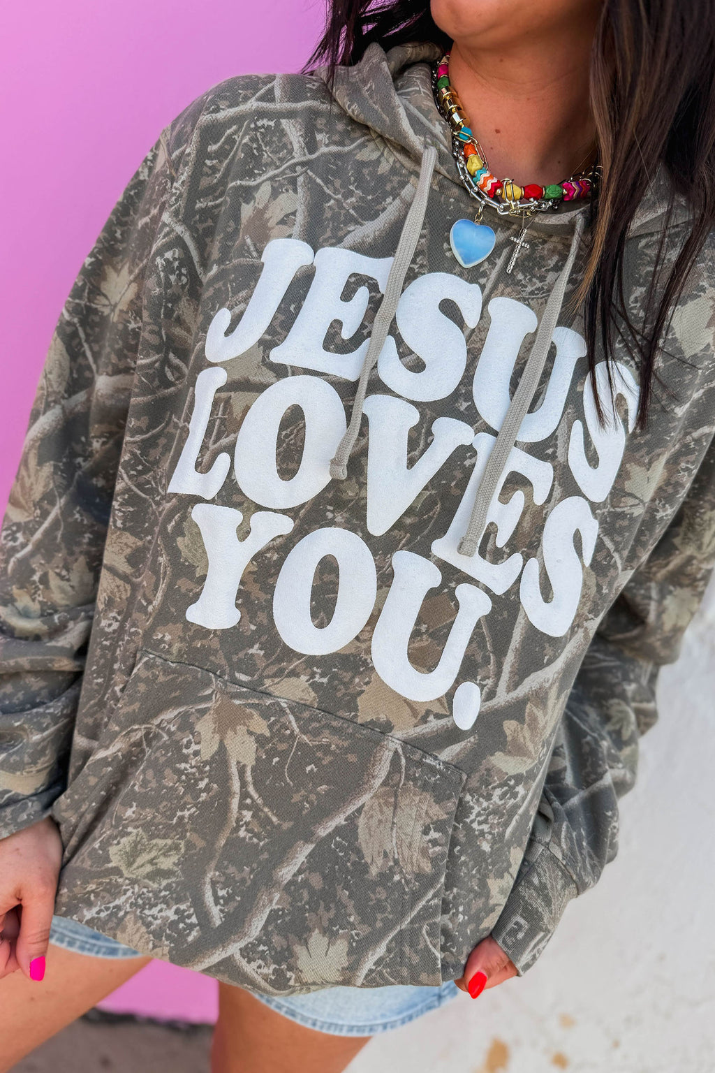 Women's brown retro camo hoodie with Jesus Loves You print