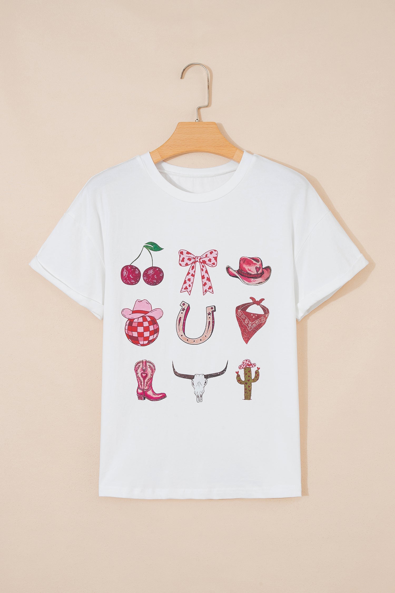 White Coquette Cowgirl Elements printed relaxed tee with hearts, boots, and stars design