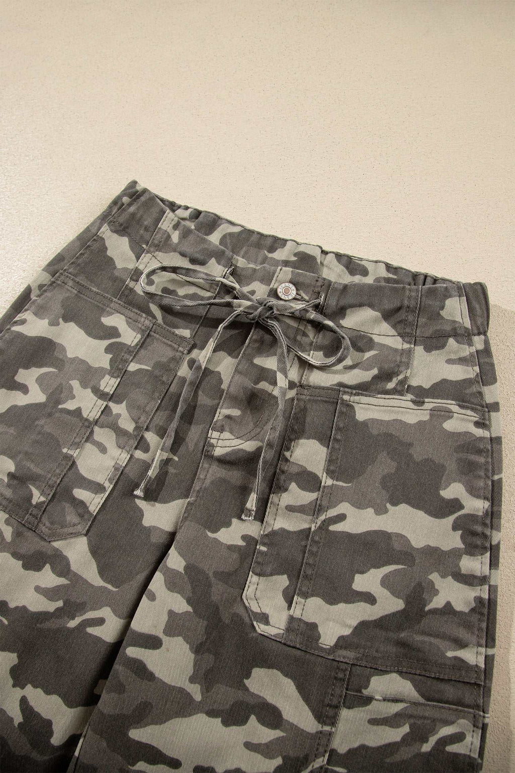 Khaki Leopard Drawstring camouflage print barrel-fit jeans with elastic waist, drawstring tie, and front patch pockets.