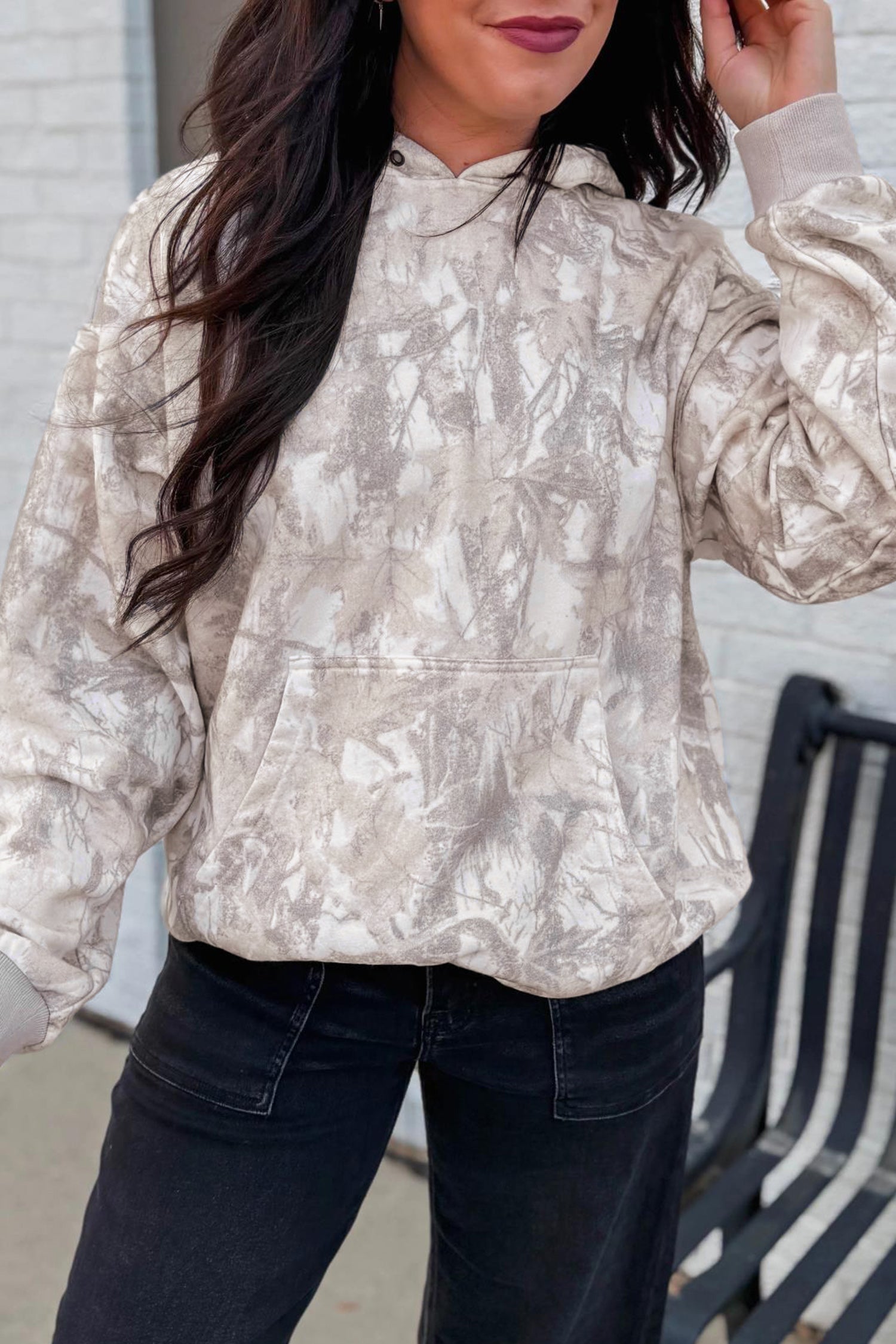 Cozy Gray Abstract Print Hoodie Lifestyle View on Bench