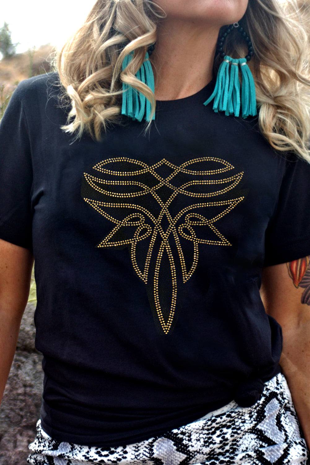 Black Rhinestone Western Graphic Tee featuring a gold rhinestone western design on a soft black cotton blend fabric.
