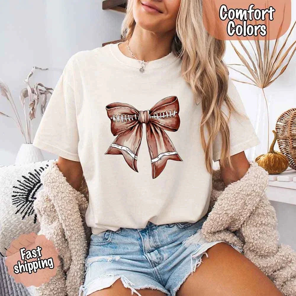 files/Comfort_Colors_Vintage_Football_Bow_T-Shirt_Cute_Game_Day_Tee_for_Women_ivory.webp