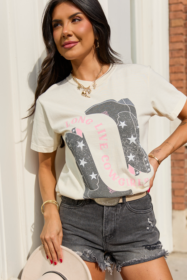 Comfort Colors Western Graphic Tee - Model Close-up near White Slat Wall