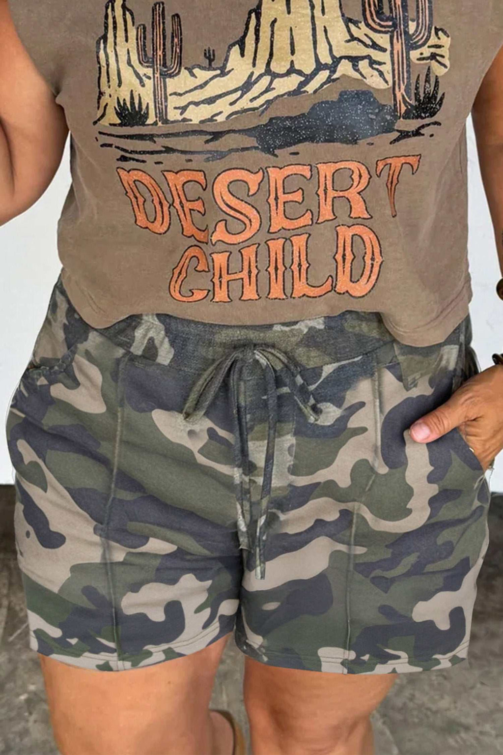 Plus size green camo shorts with tie elastic waist and pockets