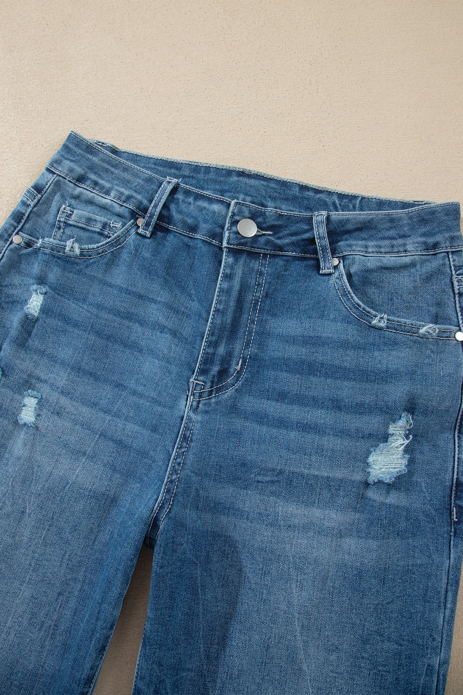 Ashleigh Blue high-waist flare jeans with frayed hem and classic denim style