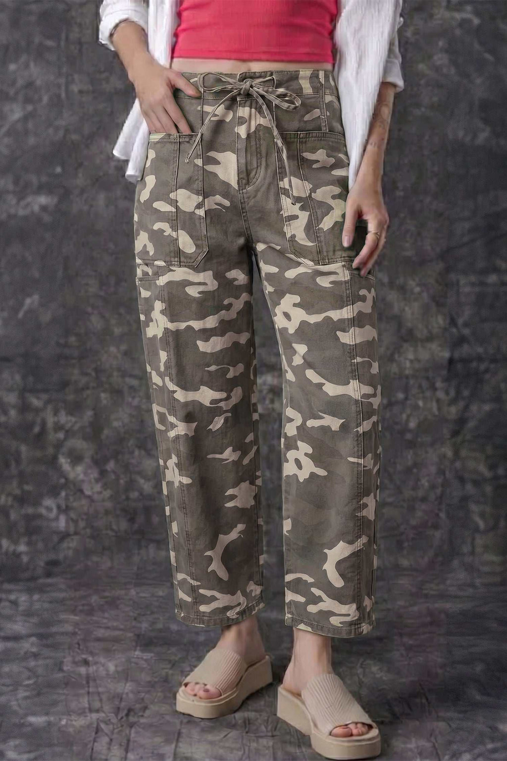 Relaxed barrel-fit jeans in khaki with a leopard print pattern, featuring an elastic waist and drawstring closure, side pockets for convenience. Khaki Leopard Drawstring style.