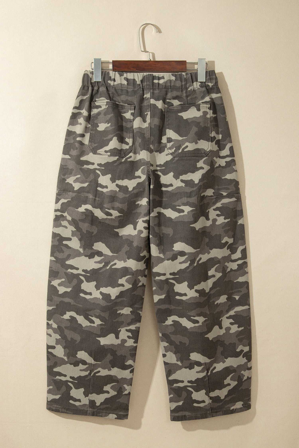 Relaxed fit Khaki Leopard Drawstring jeans with an elastic waist and camouflage pattern in muted khaki and gray tones