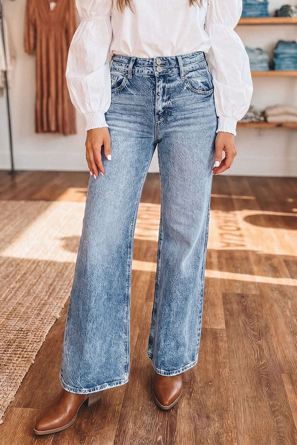 Women's beau blue acid wash flare jeans with pocket details