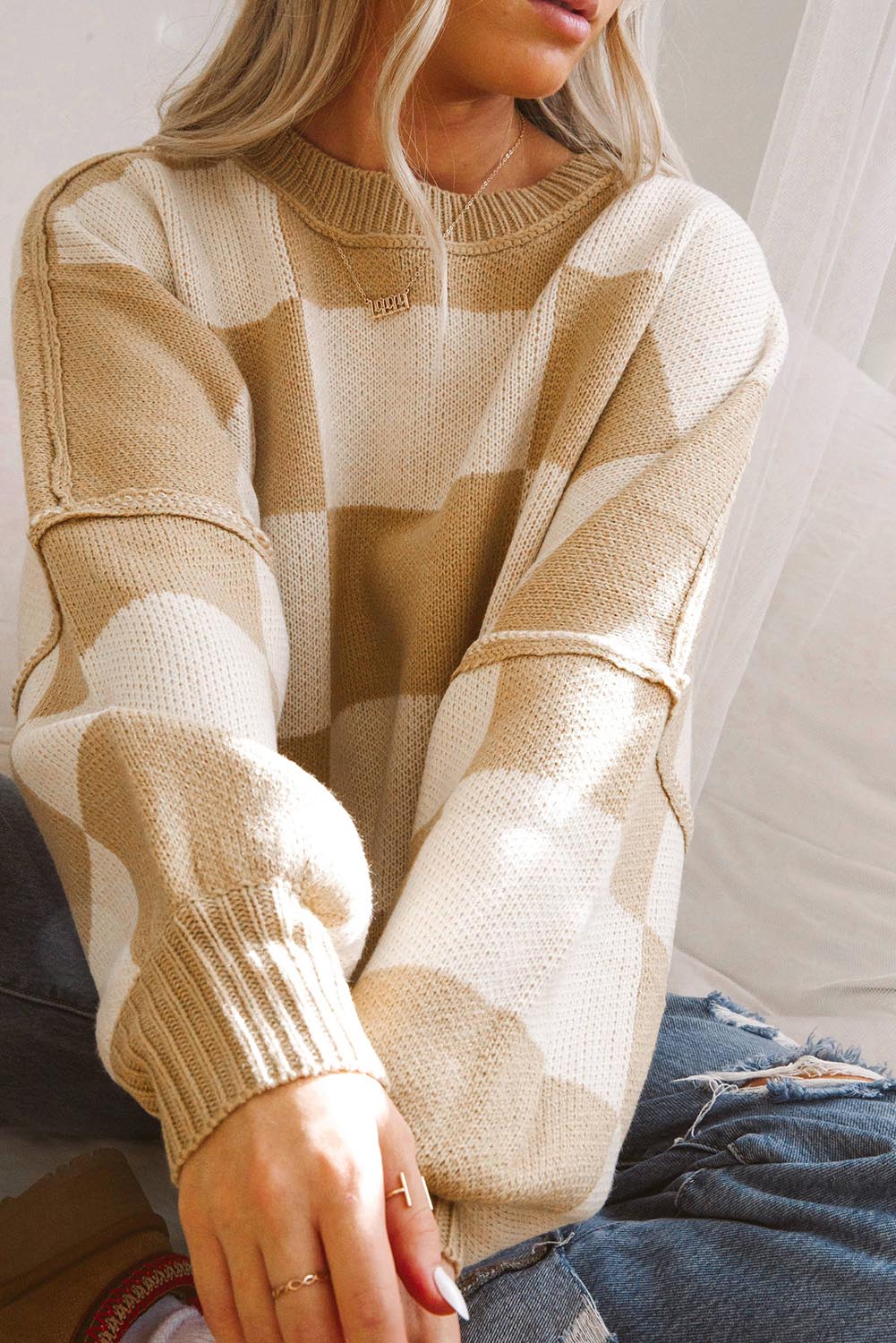 Black checkered bishop sleeve sweater with premium soft fabric and modern design