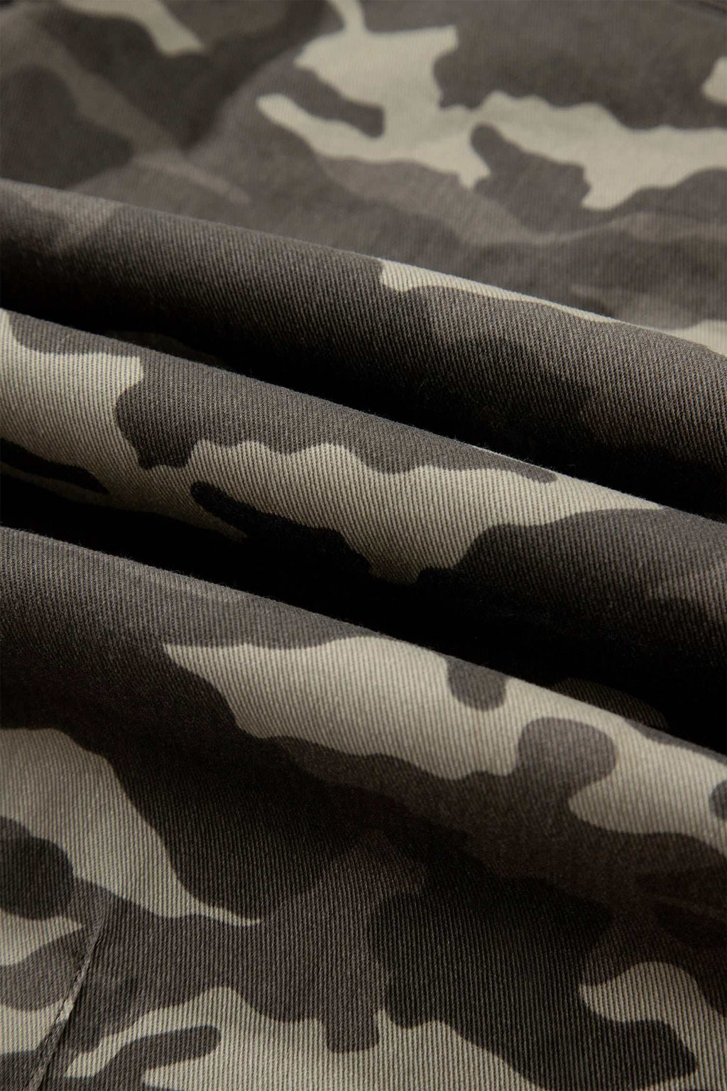 Khaki Leopard Drawstring barrel jeans fabric featuring a camouflage-like leopard print in shades of khaki and brown