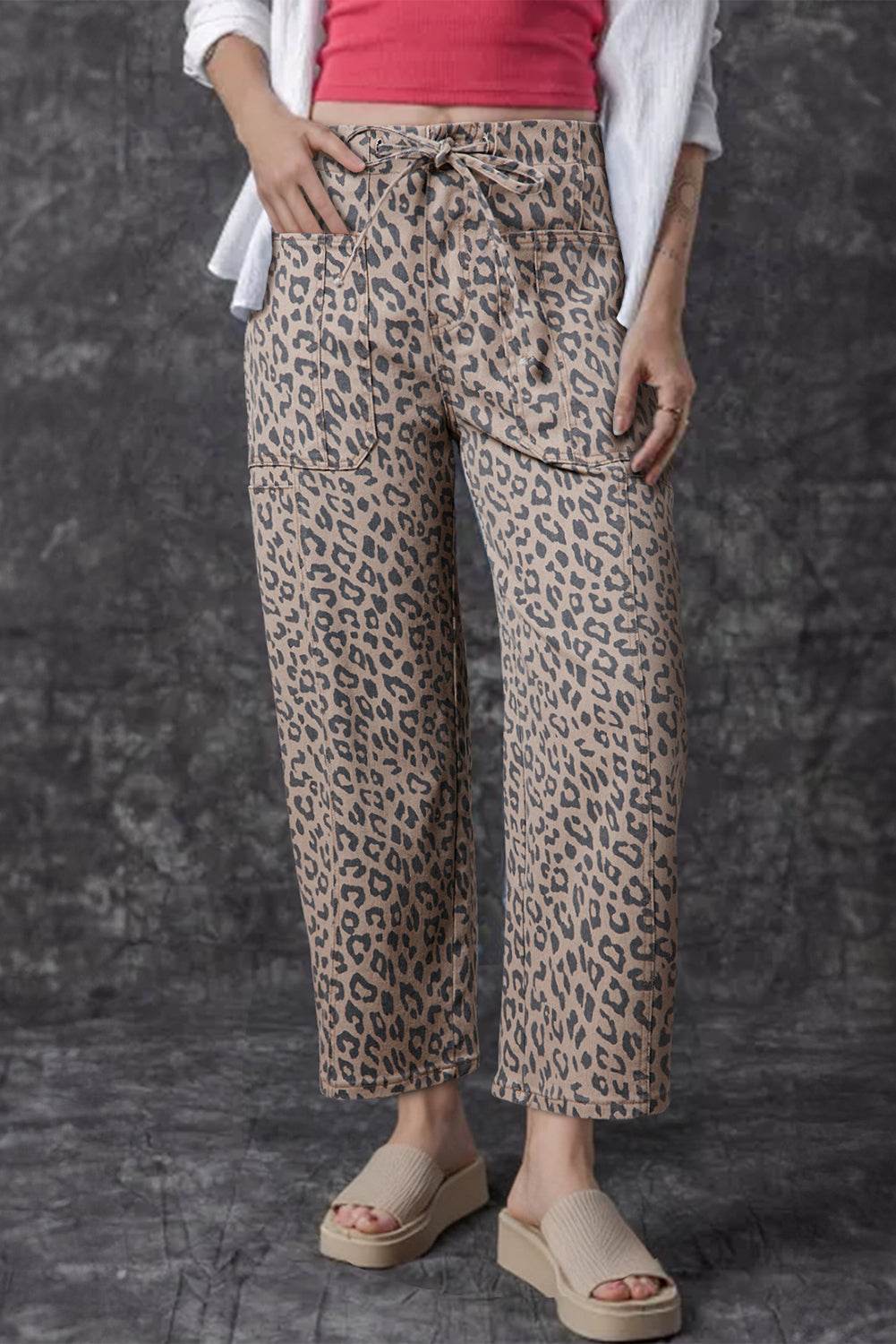 Khaki Leopard Drawstring relaxed barrel-fit jeans with elastic waist, side pockets, and leopard print pattern