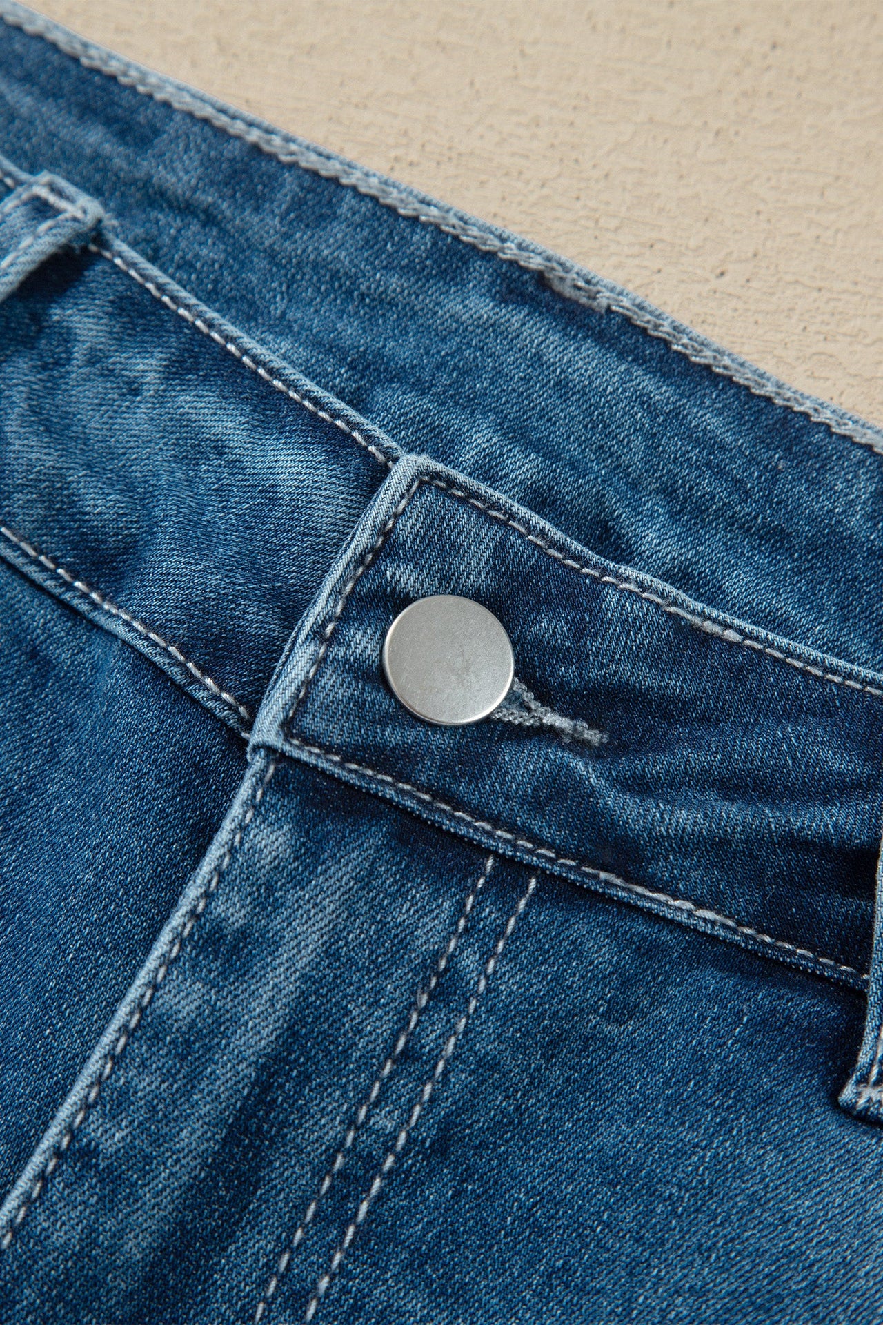 Ashleigh Blue high waist flare jeans with frayed hem and classic denim styling
