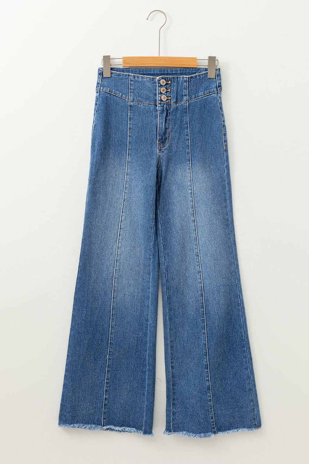 Blue denim flare jeans with a high waist, button fly, raw hem, and seamed detailing, contrasted with the focus keyword Coffee High Waist.