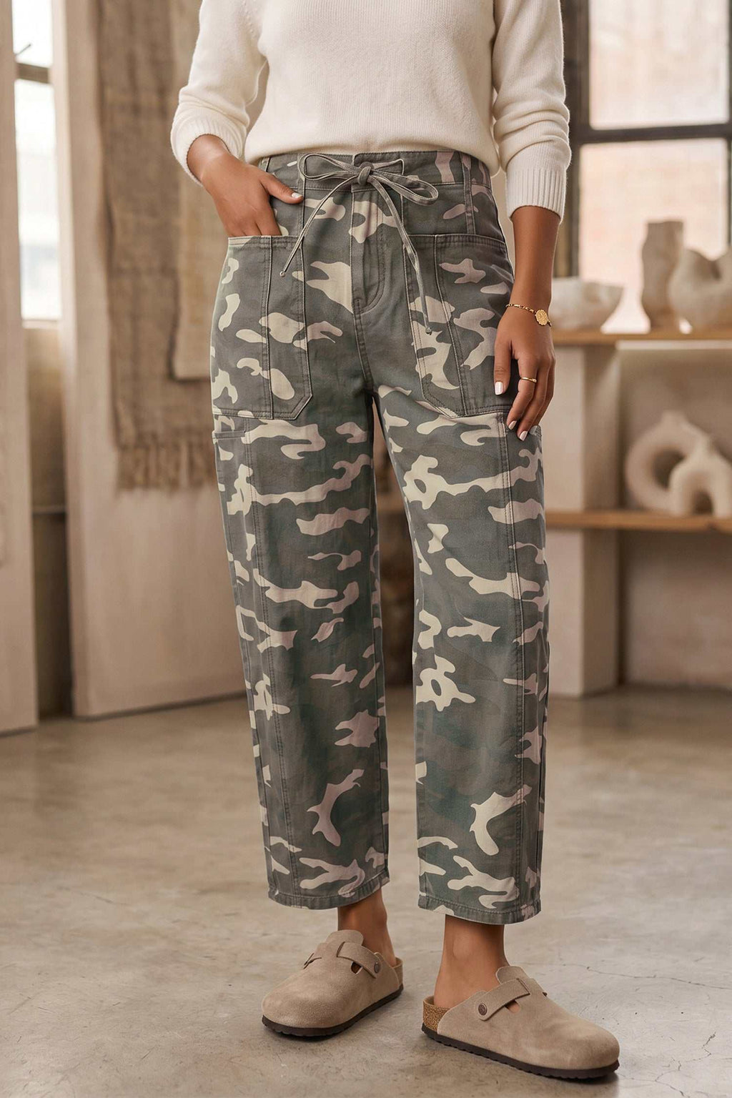 Relaxed mid-rise Khaki Leopard Drawstring barrel jeans in camouflage print with side pockets and adjustable waistband tie.