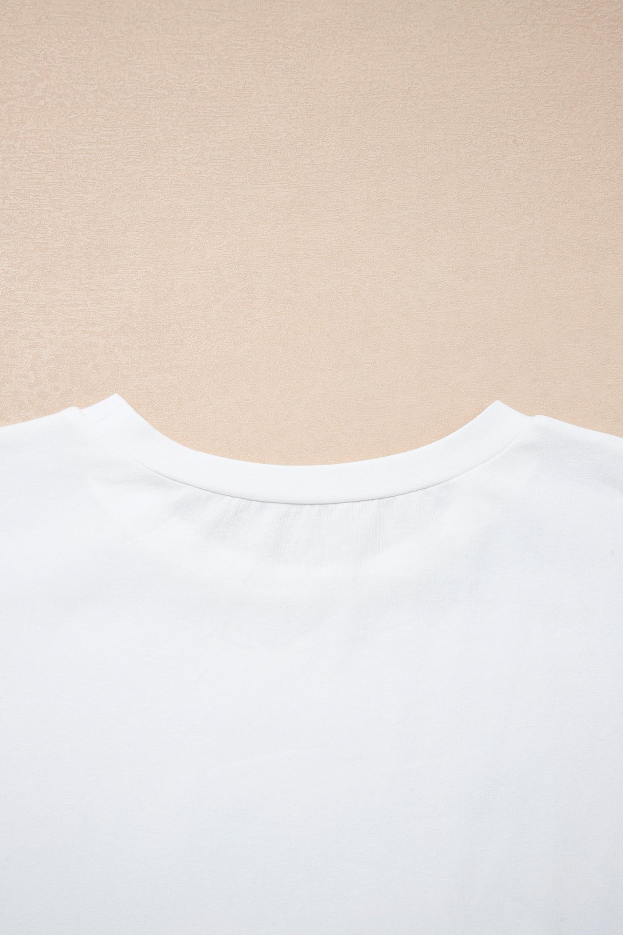 White Coquette Cowgirl Elements relaxed tee with heart, boot, and star graphics on soft cotton blend fabric