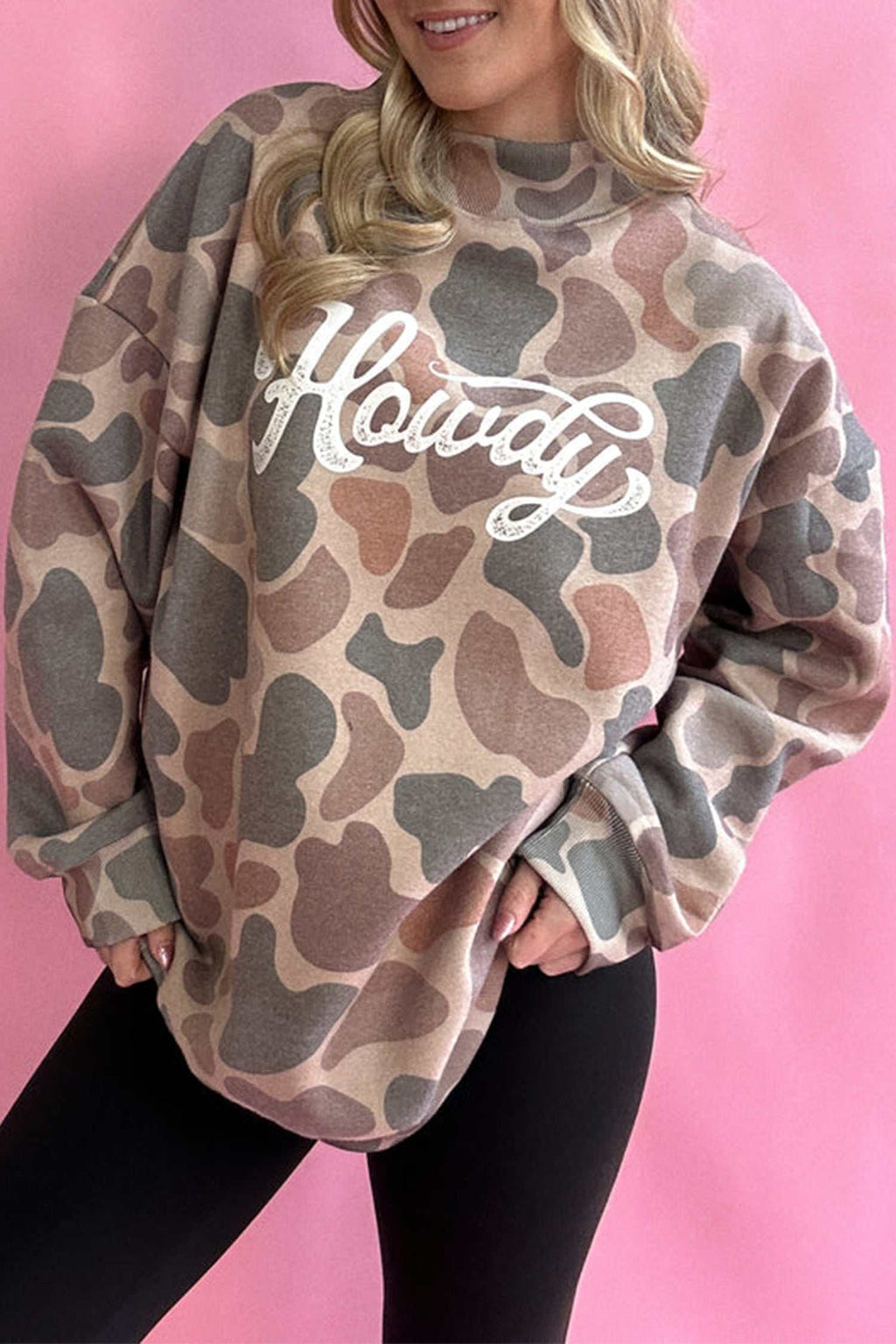Women's multicolor camo baggy pullover sweatshirt with Howdy lettering and mock neck