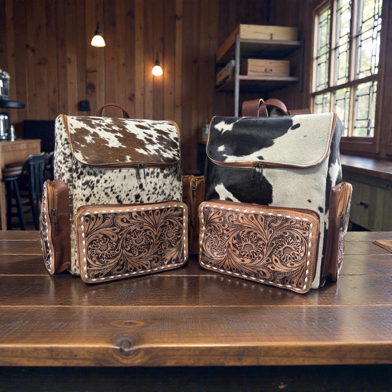 Genuine Western cowhide leather backpack diaper bag with zippered pockets and adjustable straps