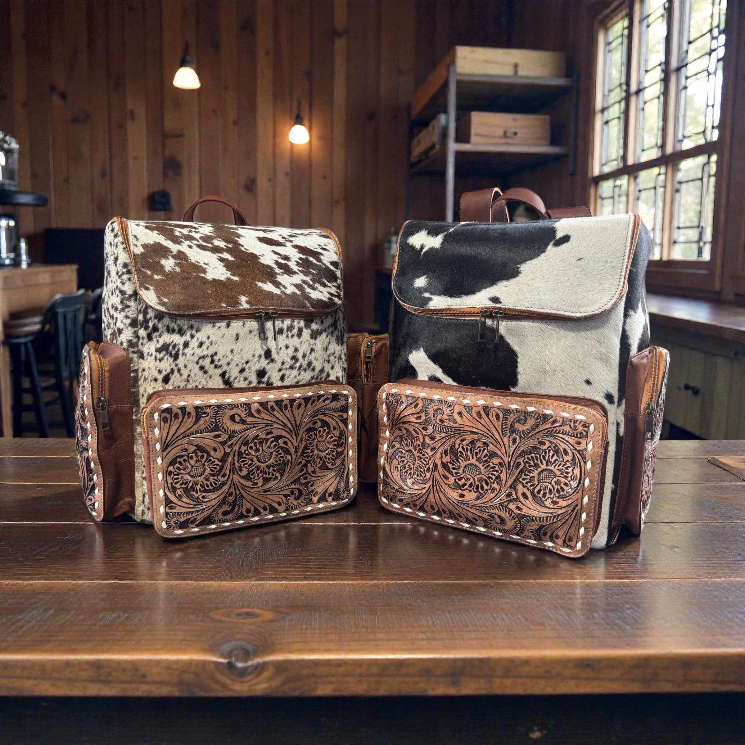 Genuine Western cowhide leather backpack diaper bag with zippered pockets and adjustable straps