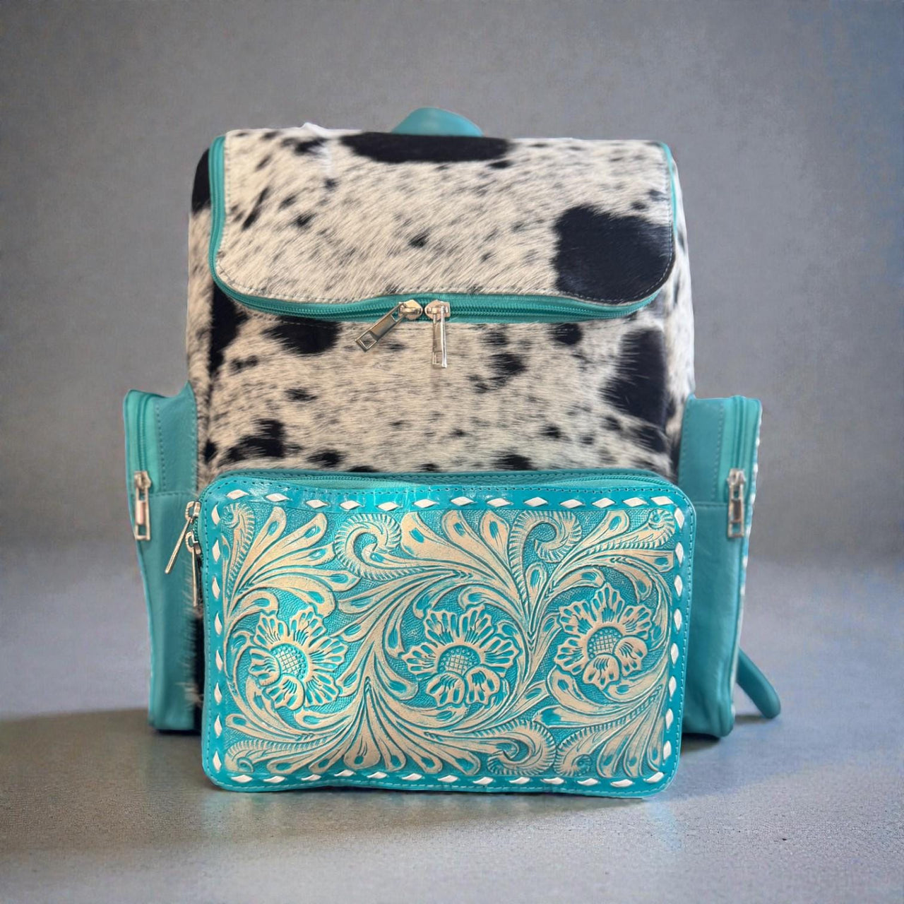 Turquoise genuine cowhide leather western backpack diaper bag with black speckled hide and grey tooling by Double B Wild Rags