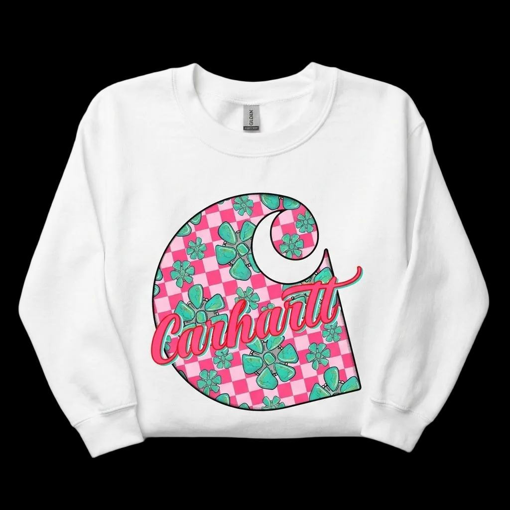 White crewneck sweatshirt with pink checkered and turquoise graphic on white studio background